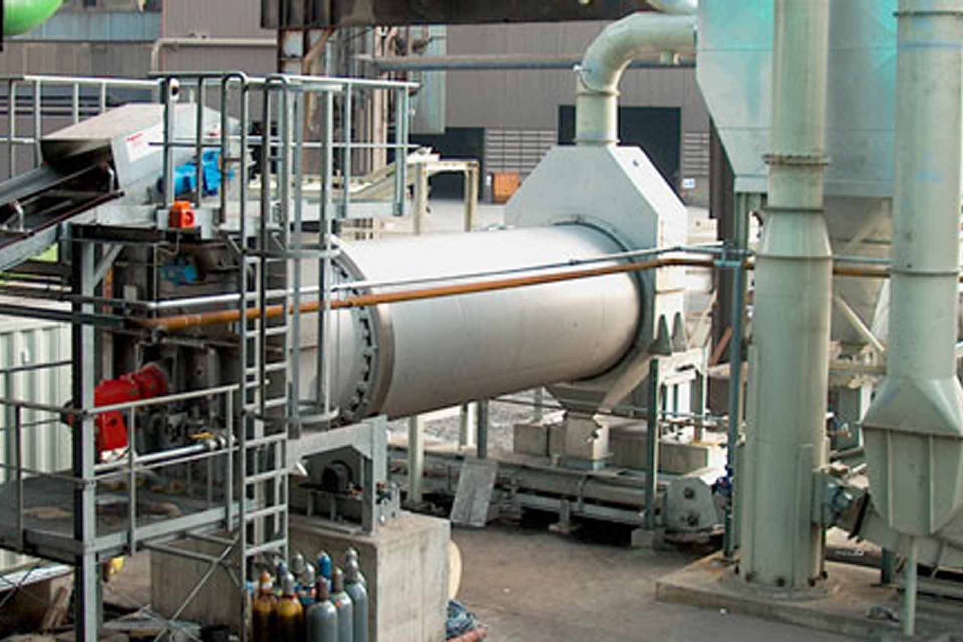 extraction and processing facility, with various machines working in tandem to extract essential oils from plants